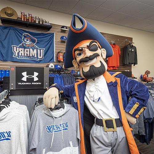 Max the Marauder with University of Mary apparel in the bookstore.